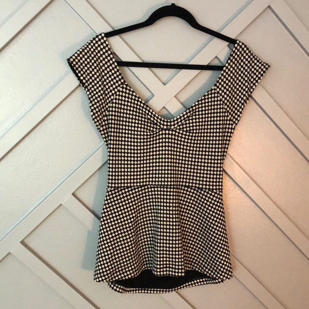 Deletta Knit Peplum Blouse with Open Back Detail